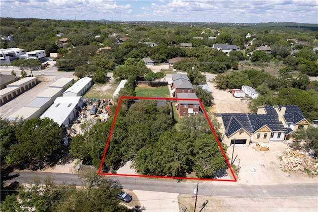 birds eye view of property with a residential view