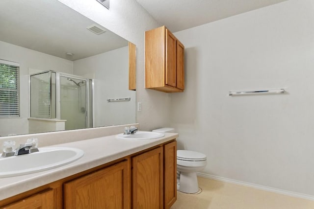 full bath with toilet, a stall shower, a sink, and visible vents