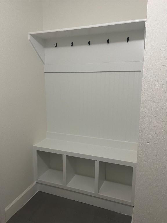 mudroom featuring baseboards