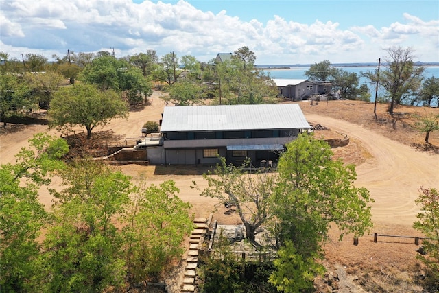 birds eye view of property with a rural view