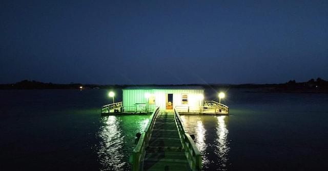 view of dock with a water view