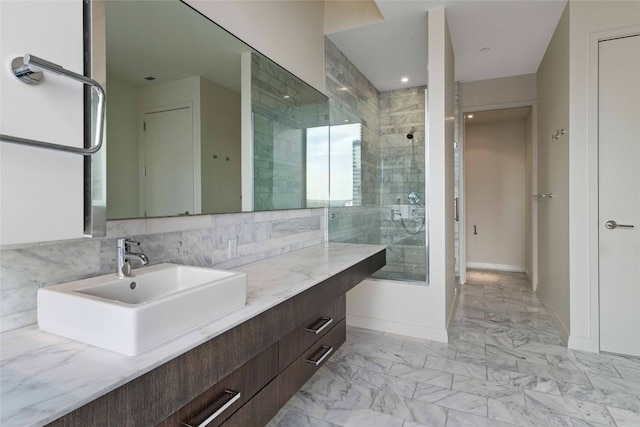 bathroom with vanity and an enclosed shower