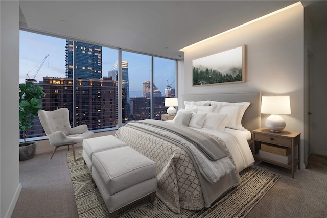 carpeted bedroom featuring a wall of windows