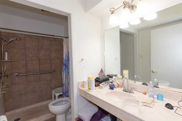 bathroom with toilet, a shower with shower curtain, and sink