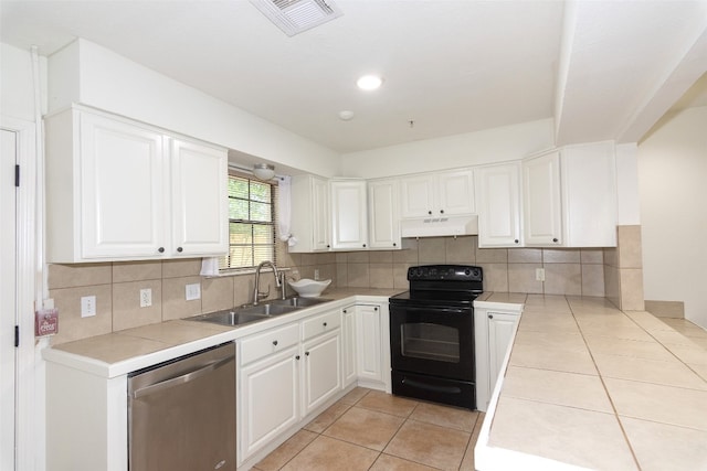 kitchen featuring black / electric stove, tasteful backsplash, white cabinets, and dishwasher