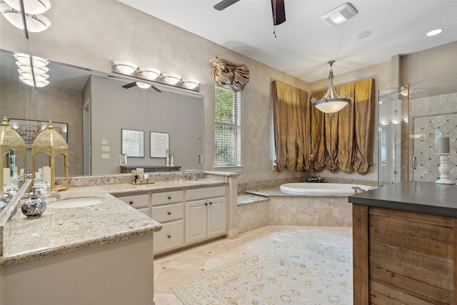 bathroom with ceiling fan, tile flooring, tiled tub, and oversized vanity