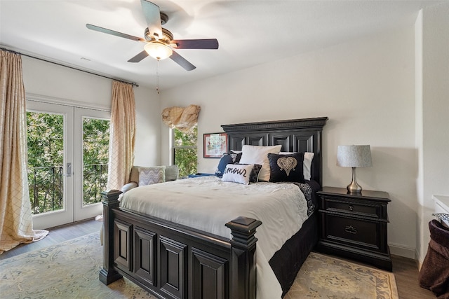 bedroom with french doors, ceiling fan, access to outside, and light hardwood / wood-style flooring