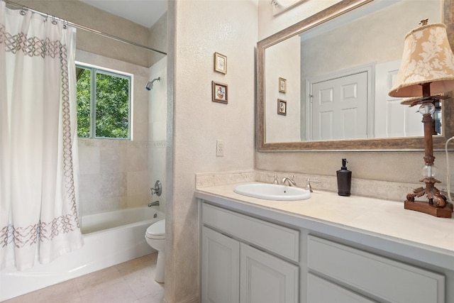 full bathroom with tile floors, oversized vanity, toilet, and shower / bathtub combination with curtain