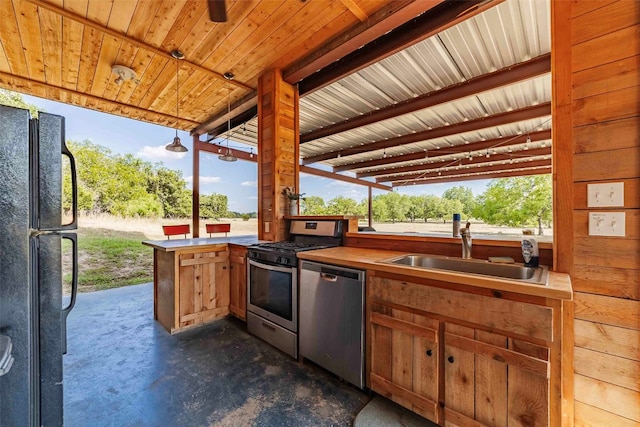 view of patio / terrace with area for grilling and sink