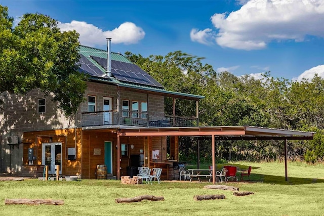95 Loma Ln, Fredericksburg, TX 78624 - view of home's community with a lawn and a deck