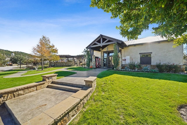 craftsman-style home featuring a front yard