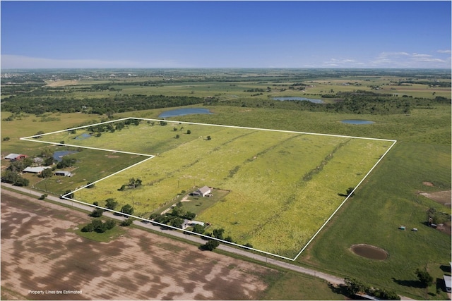 bird's eye view featuring a rural view and a water view