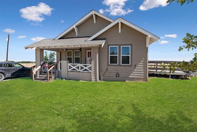 view of front of home featuring a front lawn