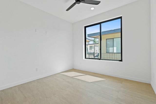 empty room featuring ceiling fan