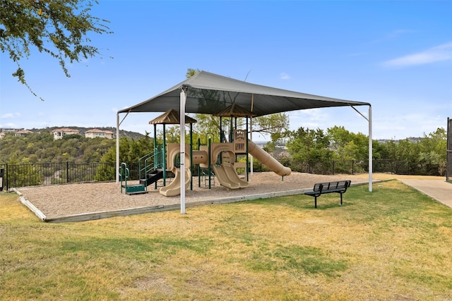 view of play area featuring a lawn