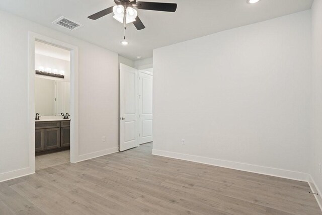 unfurnished bedroom featuring recessed lighting, visible vents, baseboards, and light wood-style flooring