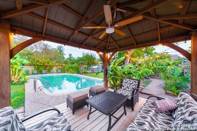 view of pool featuring a gazebo, an outdoor hangout area, and a patio