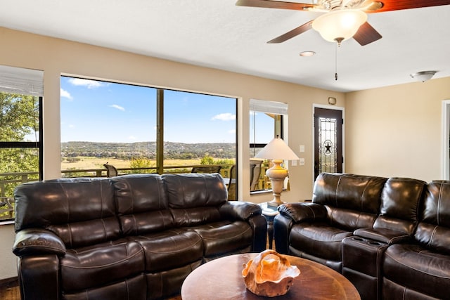 living room with ceiling fan