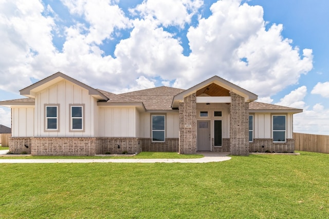 view of front of house with a front lawn