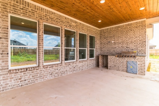 view of patio / terrace featuring an outdoor kitchen and area for grilling