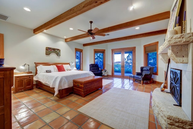 tiled bedroom with ceiling fan, a premium fireplace, french doors, beamed ceiling, and access to outside