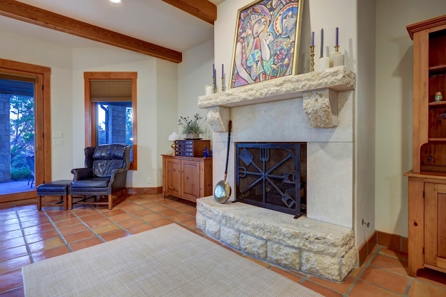 tiled living room featuring beamed ceiling