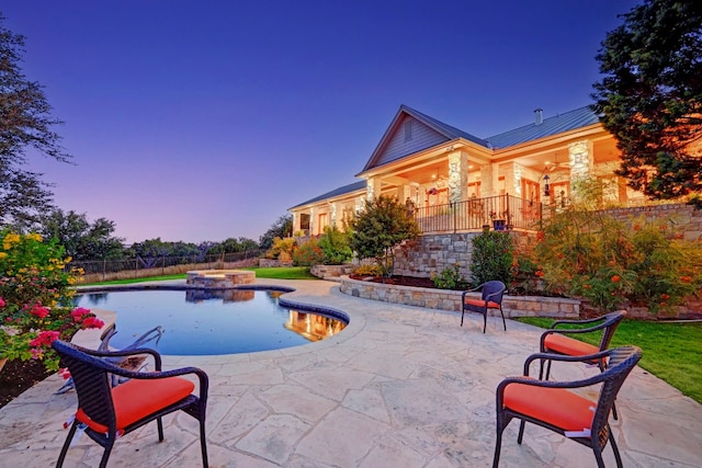 view of pool featuring a patio area