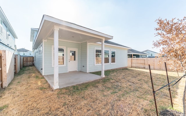 back of house featuring a patio area