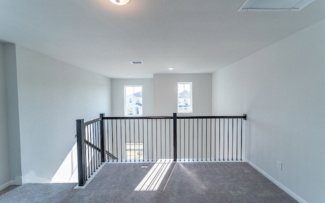 empty room with carpet floors