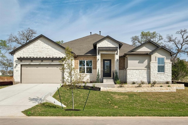 view of front facade featuring a garage and a front yard