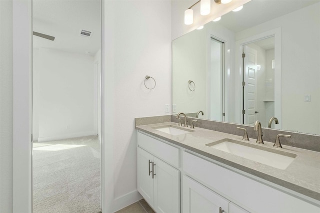 bathroom with double vanity