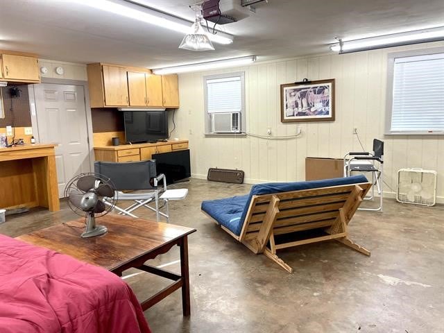 living room with concrete flooring