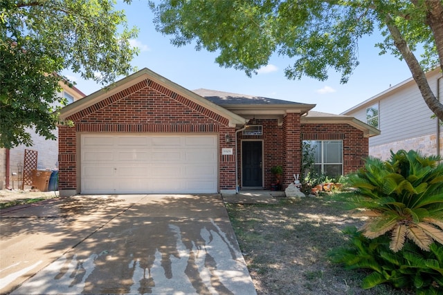 single story home featuring a garage