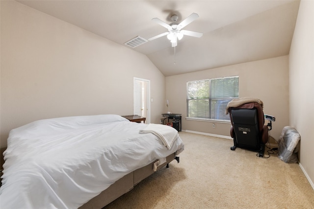 carpeted bedroom featuring ceiling fan and vaulted ceiling