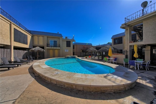 view of pool featuring a patio area