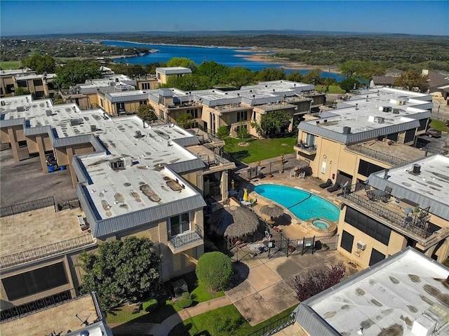 birds eye view of property featuring a water view