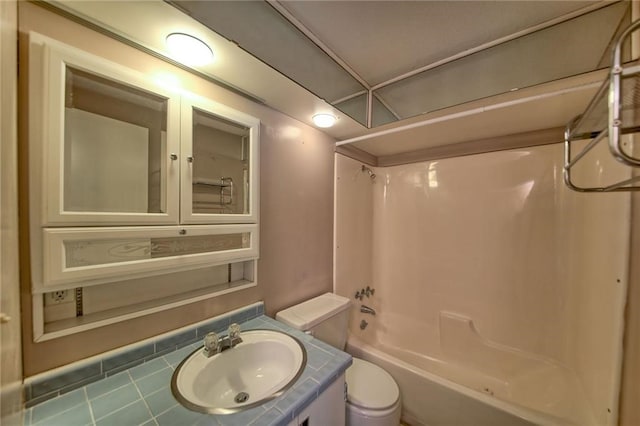 full bathroom with vanity, shower / bath combination, and toilet