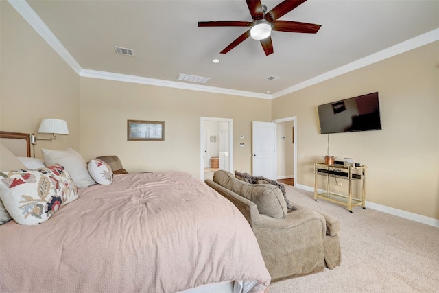 carpeted bedroom with ceiling fan and ornamental molding