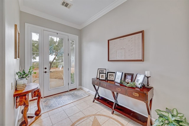 tiled foyer entrance with ornamental molding