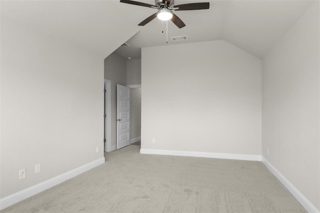 bonus room with lofted ceiling, light colored carpet, and ceiling fan