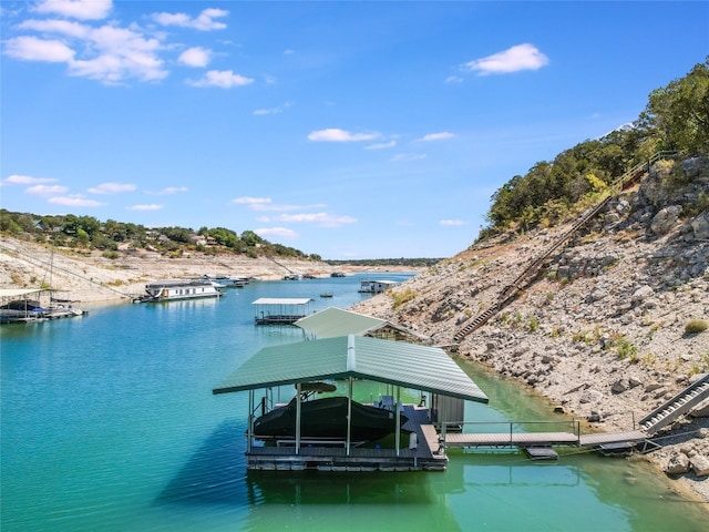 dock area featuring a water view