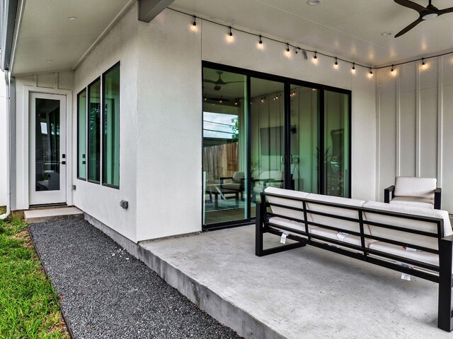 property entrance featuring ceiling fan and a patio area