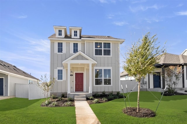 view of front of home with a front lawn