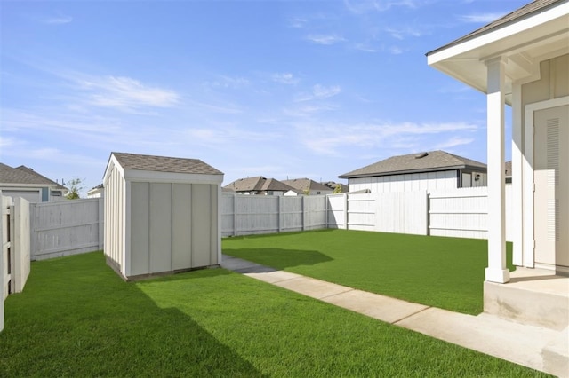 view of yard with a storage shed