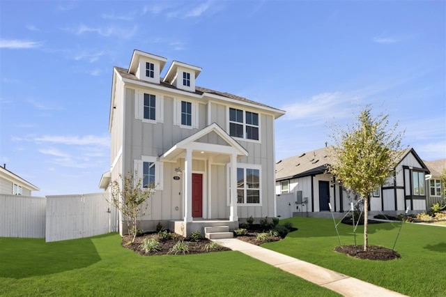 view of front of home featuring a front lawn