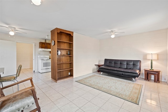 living room with ceiling fan and light tile flooring