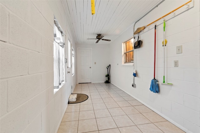 tiled foyer entrance with wooden ceiling and ceiling fan