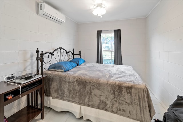 bedroom featuring a wall unit AC