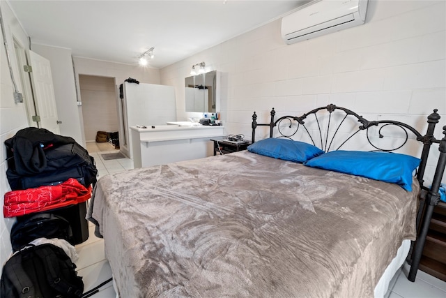 bedroom with light tile floors and a wall mounted AC