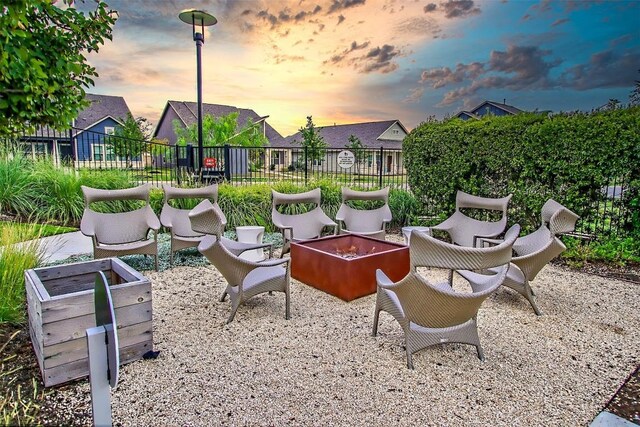 view of patio terrace at dusk